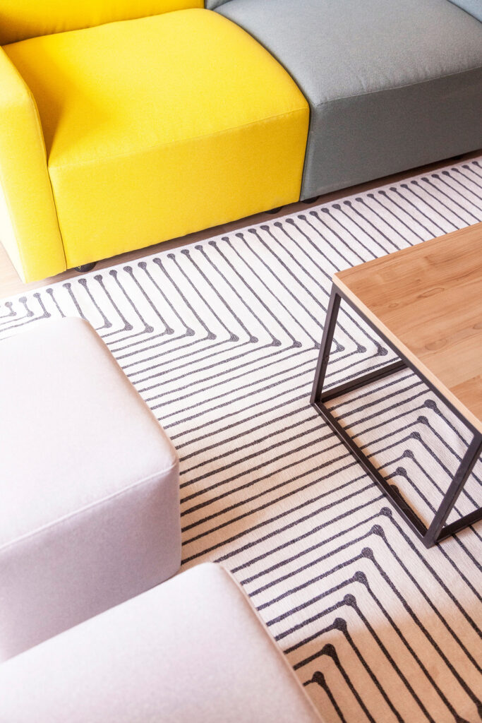 Birds eye view of patterned area rug in The Laundry Rooms Hamilton suite